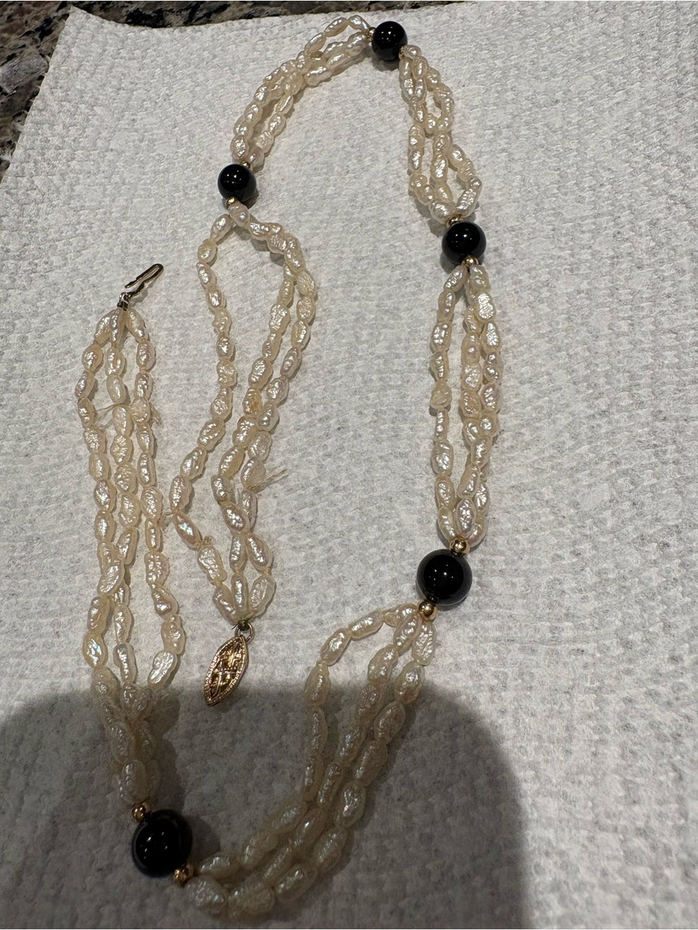 Multi-Strand Cream Pearl Necklace with Black Bead Accents